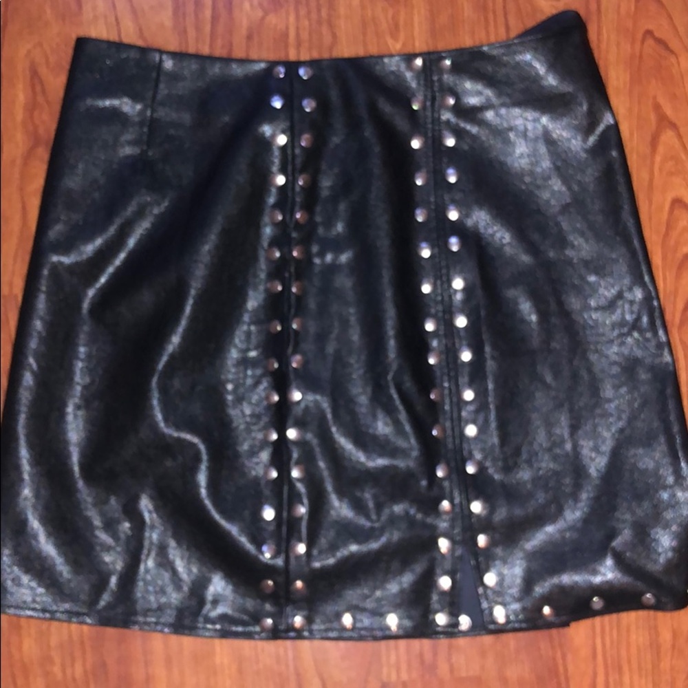 Black skirt with metal chaps